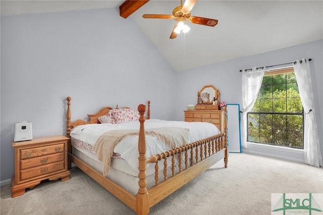 bedroom with lofted ceiling with beams, baseboards, a ceiling fan, and carpet flooring