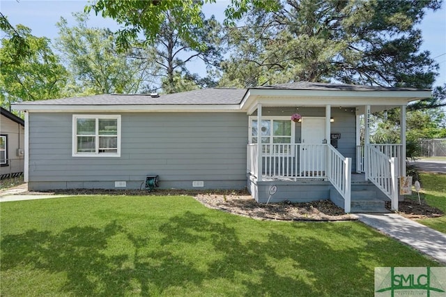 1237 W 50th St, Savannah, GA 31405 - view of front facade with a front lawn, crawl space, roof with shingles, and covered porch