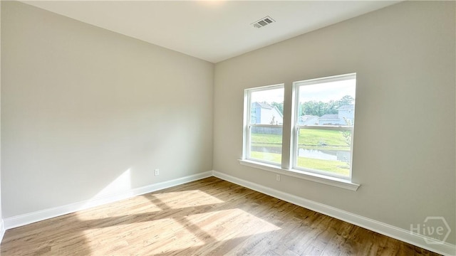 145 Nettleton Ln, Richmond Hill, GA 31324 - unfurnished room with baseboards and wood finished floors
