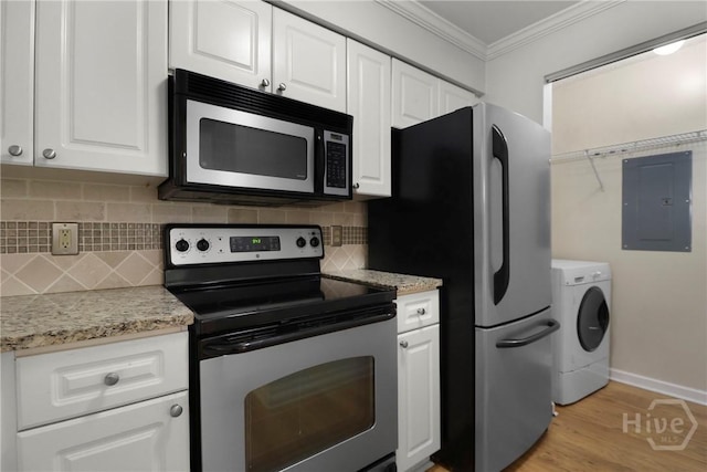 12300 Apache Ave Unit 1212, Savannah, GA 31419 - kitchen with stainless steel appliances, washer / clothes dryer, electric panel, crown molding, and white cabinets