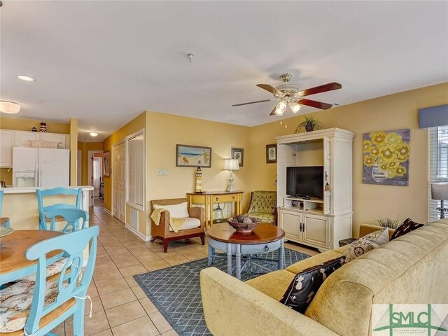 2 17th St Unit H 8, Tybee Island, GA 31328 - living area with a ceiling fan and light tile patterned flooring