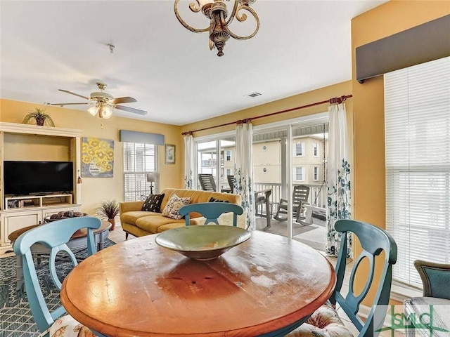 dining area featuring visible vents and ceiling fan