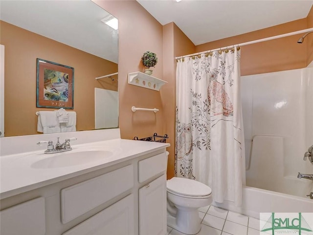 full bathroom with shower / bath combo, tile patterned flooring, vanity, and toilet