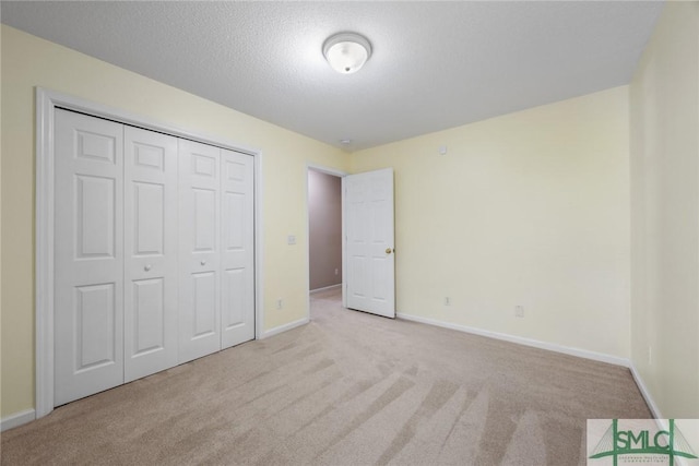 153 Fire Thorn Ln, Pooler, GA 31322 - unfurnished bedroom featuring baseboards, carpet, and a closet