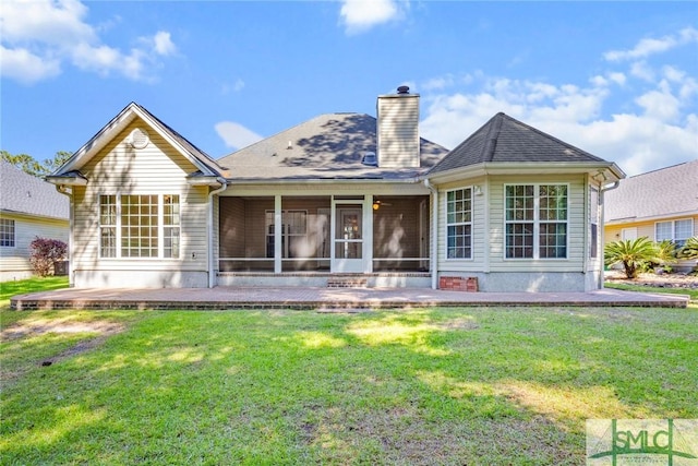 153 Fire Thorn Ln, Pooler, GA 31322 - back of property featuring a patio, a sunroom, a yard, and a chimney