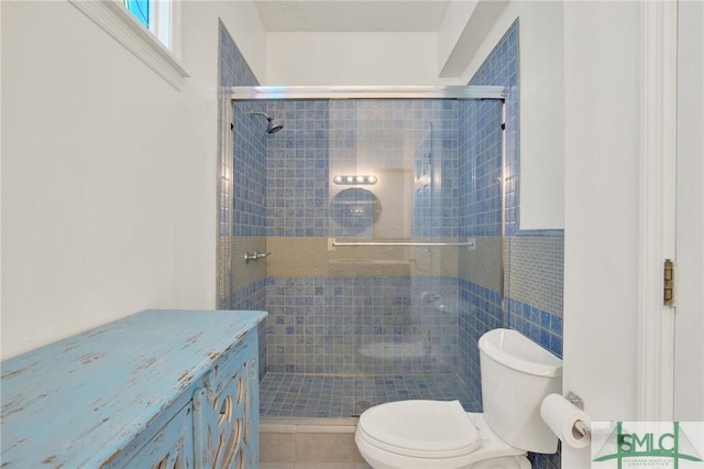 12 Carpenter Rd, Tybee Island, GA 31328 - full bathroom featuring a stall shower, tile patterned flooring, and vanity