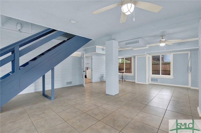 12 Carpenter Rd, Tybee Island, GA 31328 - unfurnished living room with ceiling fan and tile patterned flooring