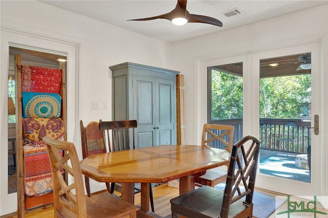 12 Carpenter Rd, Tybee Island, GA 31328 - dining space featuring ceiling fan and light wood-style floors