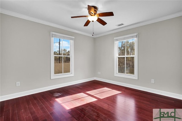 836 E Park Ave, Savannah, GA 31401 - empty room featuring plenty of natural light, wood finished floors, baseboards, a ceiling fan, and crown molding