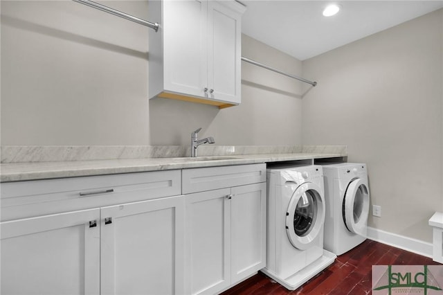 836 E Park Ave, Savannah, GA 31401 - laundry room with washing machine and dryer, cabinet space, dark wood finished floors, baseboards, and recessed lighting