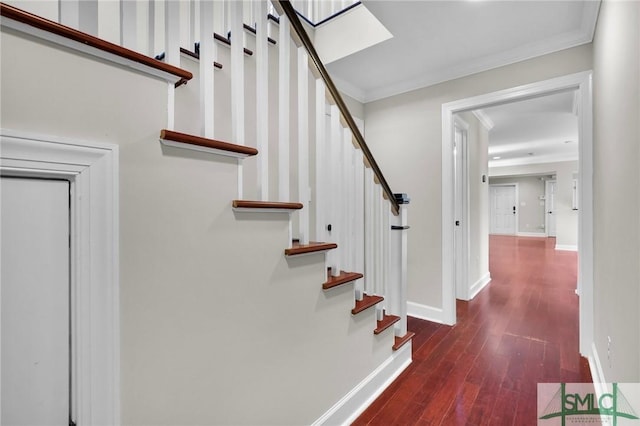 836 E Park Ave, Savannah, GA 31401 - staircase with ornamental molding, wood finished floors, and baseboards