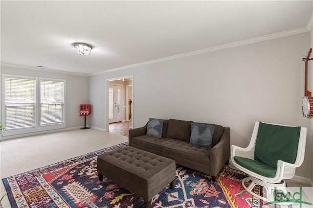 carpeted living area with baseboards and ornamental molding