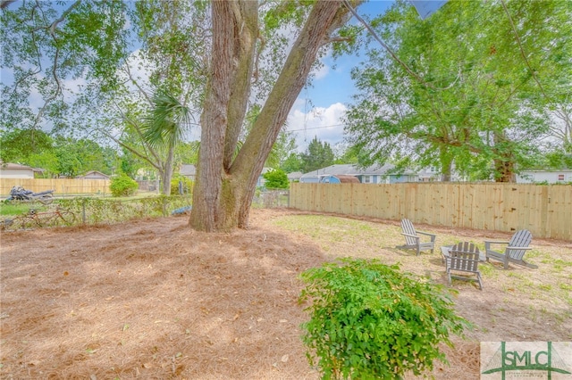 view of yard with fence