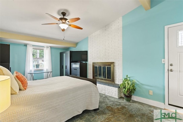 512 Winwood Pl, Savannah, GA 31419 - bedroom with a brick fireplace, vaulted ceiling, concrete floors, baseboards, and a ceiling fan