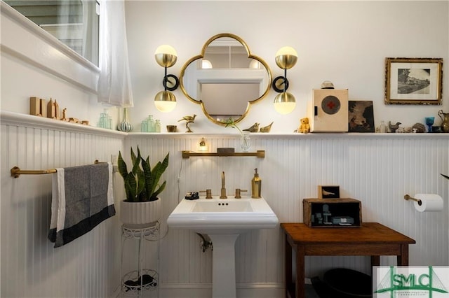 bathroom featuring a wainscoted wall