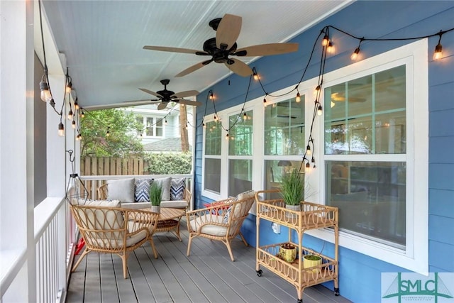exterior space with ceiling fan and an outdoor hangout area