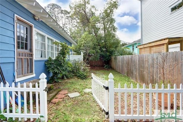 view of yard featuring a fenced backyard