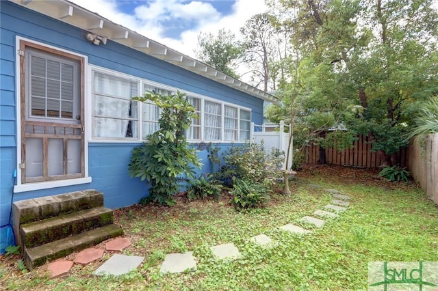 view of yard with fence