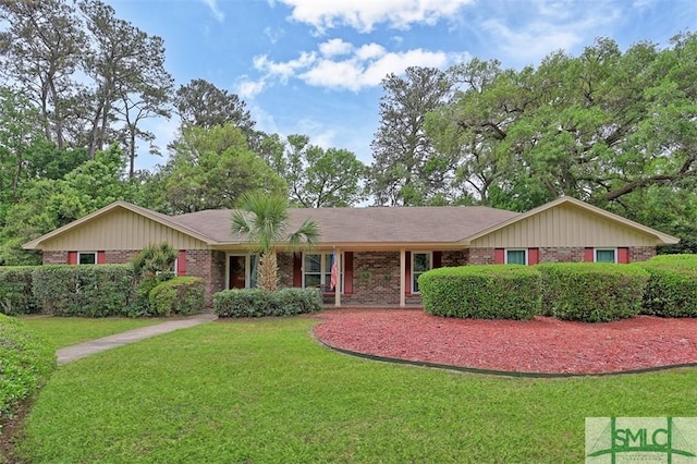 121 Steerforth Rd, Savannah, GA 31410 - ranch-style house featuring brick siding and a front lawn