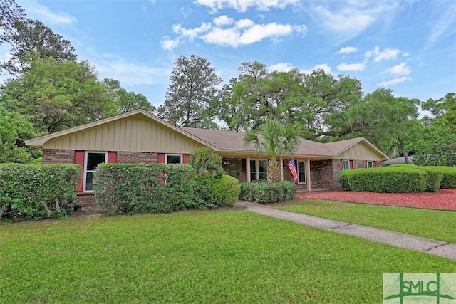 121 Steerforth Rd, Savannah, GA 31410 - ranch-style house featuring brick siding, board and batten siding, and a front yard