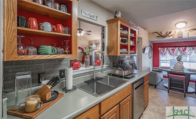 kitchen featuring open shelves, a sink, dishwasher, brown cabinetry, and backsplash