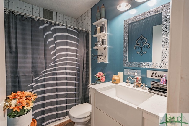 full bathroom with toilet, a shower with curtain, and vanity