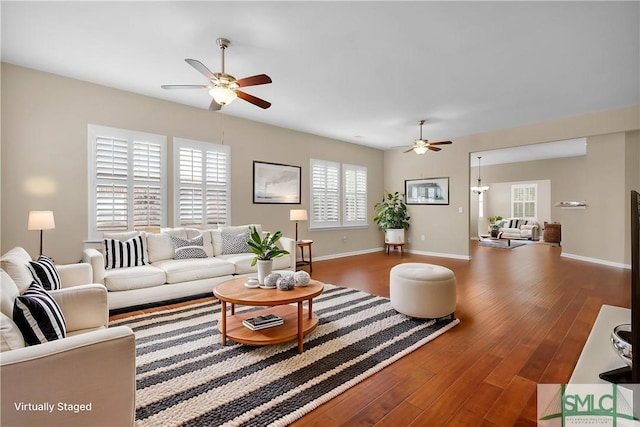 103 Regency Cir, Pooler, GA 31322 - living area featuring a ceiling fan, wood finished floors, and plenty of natural light