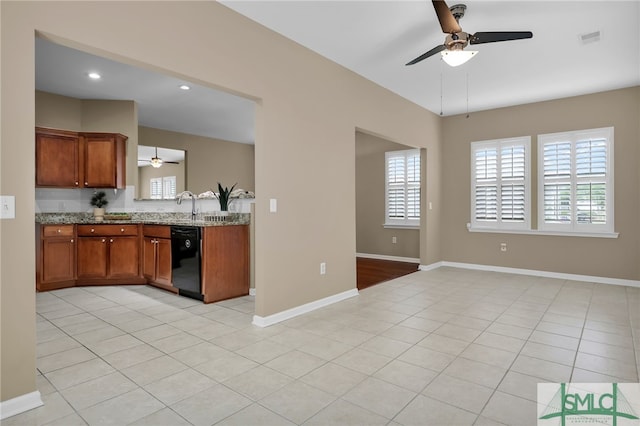103 Regency Cir, Pooler, GA 31322 - kitchen with a ceiling fan, black dishwasher, brown cabinetry, baseboards, and recessed lighting