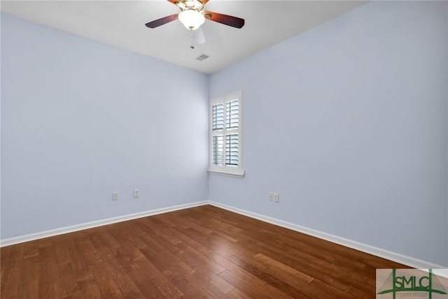103 Regency Cir, Pooler, GA 31322 - empty room featuring dark wood-style flooring, baseboards, and ceiling fan