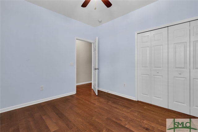 103 Regency Cir, Pooler, GA 31322 - unfurnished bedroom featuring dark wood-style flooring, baseboards, a closet, and ceiling fan