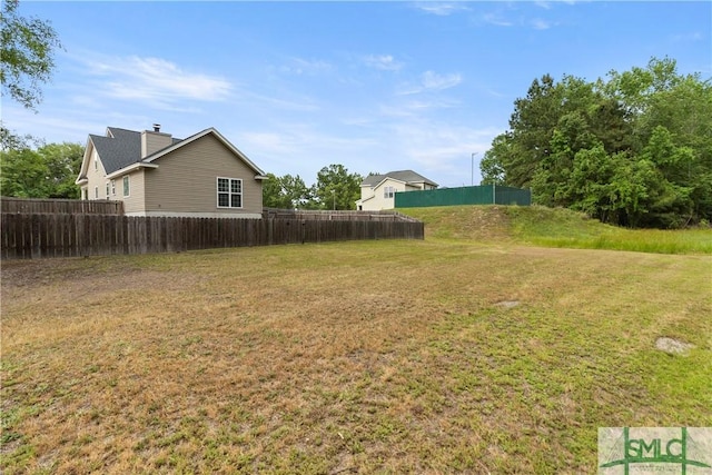 view of yard with fence