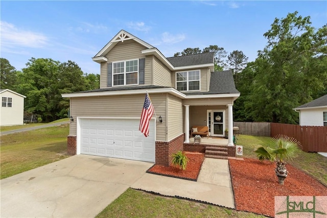 traditional-style house with fence, a front lawn, concrete driveway, covered porch, and a garage
