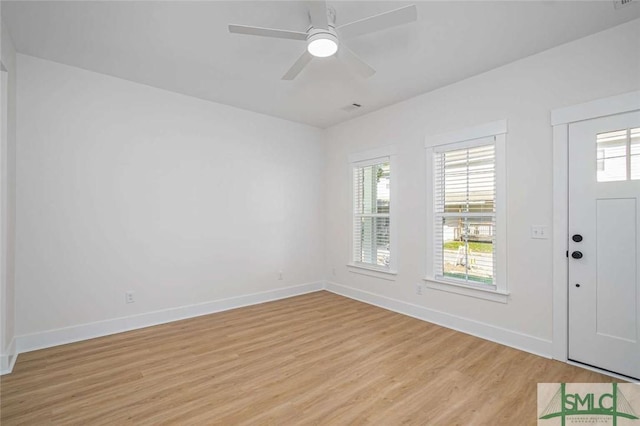 1203 E Bolton St, Savannah, GA 31404 - foyer with baseboards, a ceiling fan, and light wood-style floors