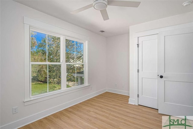1203 E Bolton St, Savannah, GA 31404 - unfurnished bedroom featuring visible vents, baseboards, light wood-style floors, and ceiling fan