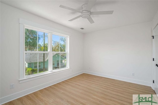1203 E Bolton St, Savannah, GA 31404 - spare room with visible vents, baseboards, light wood-style floors, and ceiling fan