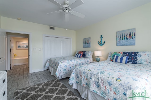 bedroom featuring baseboards, visible vents, a ceiling fan, wood finished floors, and a closet
