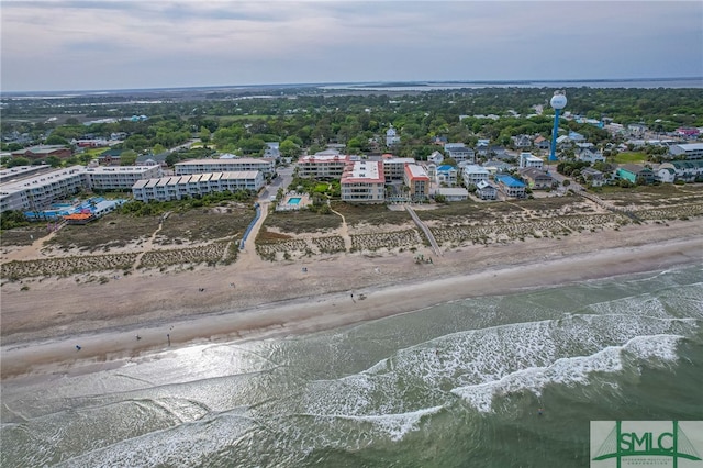 drone / aerial view with a view of the beach and a water view