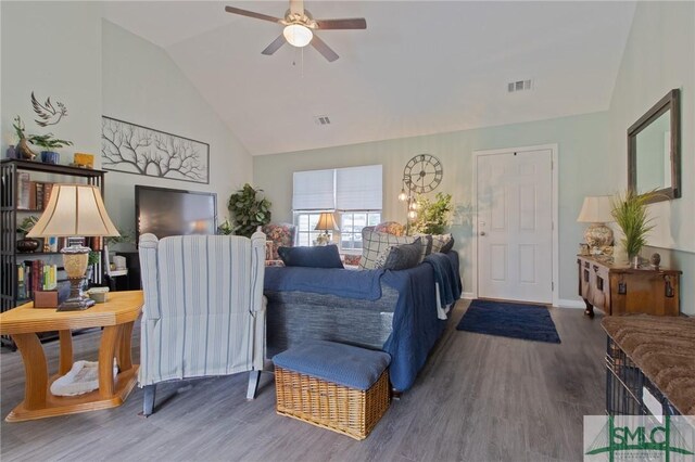 209 Bull St, Glennville, GA 30427 - living area featuring visible vents, a ceiling fan, wood finished floors, and high vaulted ceiling