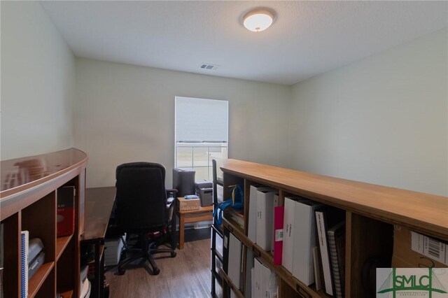 209 Bull St, Glennville, GA 30427 - office featuring wood finished floors and visible vents