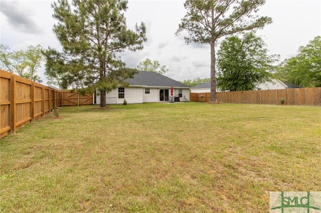 209 Bull St, Glennville, GA 30427 - view of yard with a fenced backyard