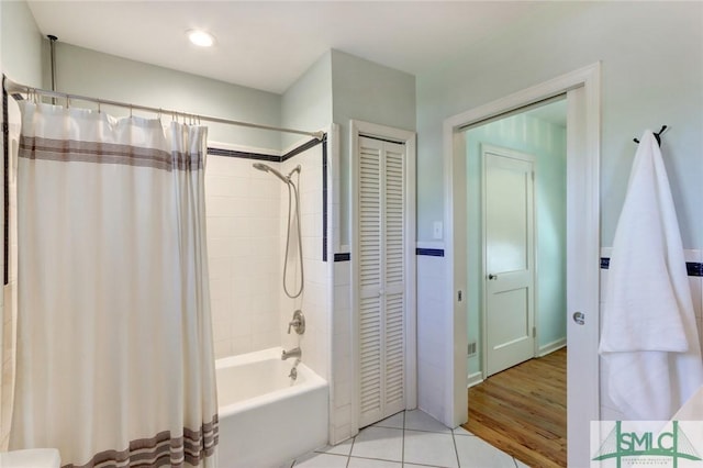 402 E 56th St, Savannah, GA 31405 - full bathroom with shower / tub combo with curtain, tile patterned flooring, and a closet