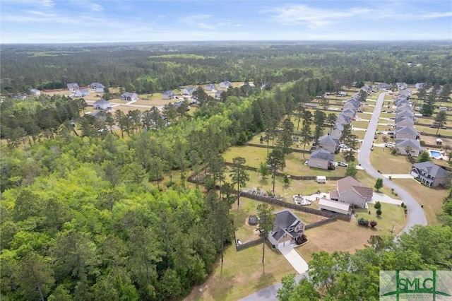 530 Briarcrest Dr NE, Ludowici, GA 31316 - bird's eye view with a residential view and a wooded view