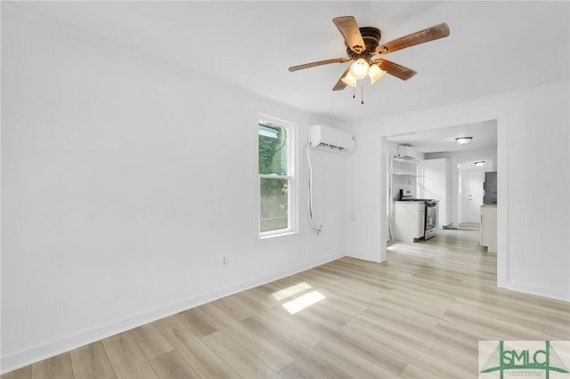 627 W 48th St, Savannah, GA 31405 - unfurnished living room with light wood-type flooring, an AC wall unit, baseboards, and ceiling fan