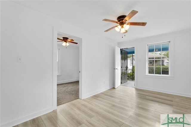 627 W 48th St, Savannah, GA 31405 - spare room featuring light wood-style flooring, baseboards, and ceiling fan