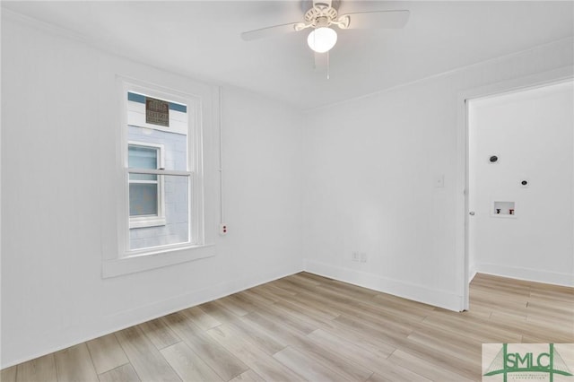 627 W 48th St, Savannah, GA 31405 - spare room featuring light wood-type flooring, a ceiling fan, and baseboards