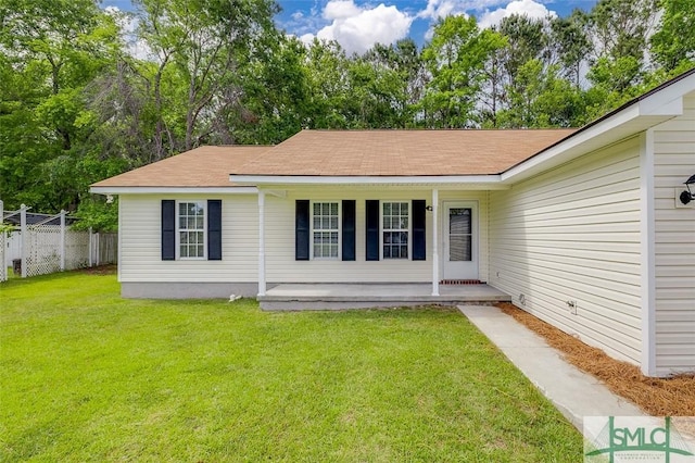 126 Four Oaks Ct, Rincon, GA 31326 - rear view of property with a lawn, fence, covered porch, and a shingled roof