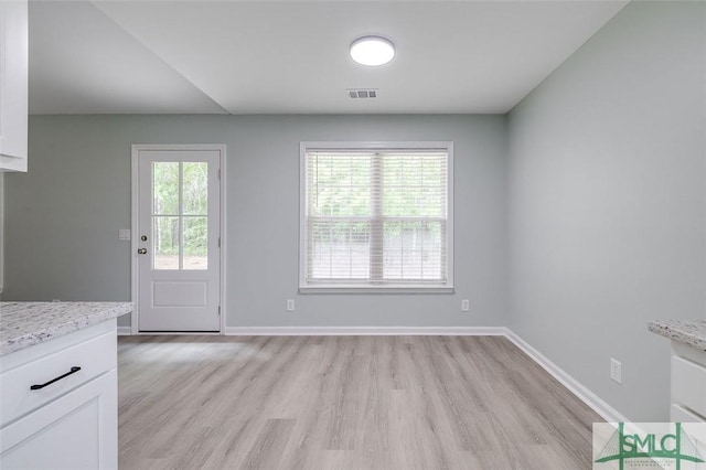126 Four Oaks Ct, Rincon, GA 31326 - interior space with visible vents, light wood-type flooring, and baseboards