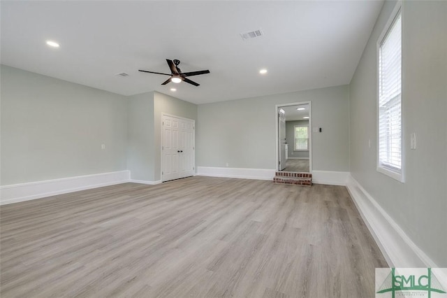 126 Four Oaks Ct, Rincon, GA 31326 - unfurnished living room featuring light wood-style flooring, visible vents, baseboards, recessed lighting, and a ceiling fan