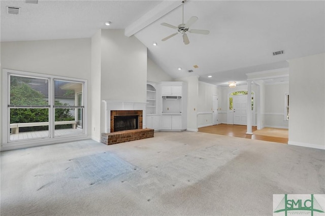 unfurnished living room with high vaulted ceiling, a ceiling fan, light carpet, beam ceiling, and visible vents