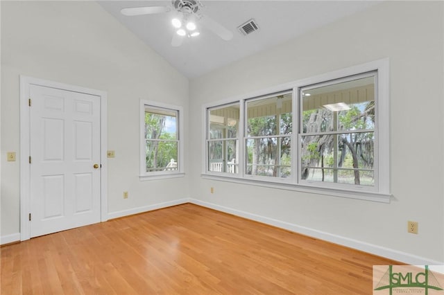 unfurnished room featuring ceiling fan, baseboards, visible vents, and light wood-type flooring
